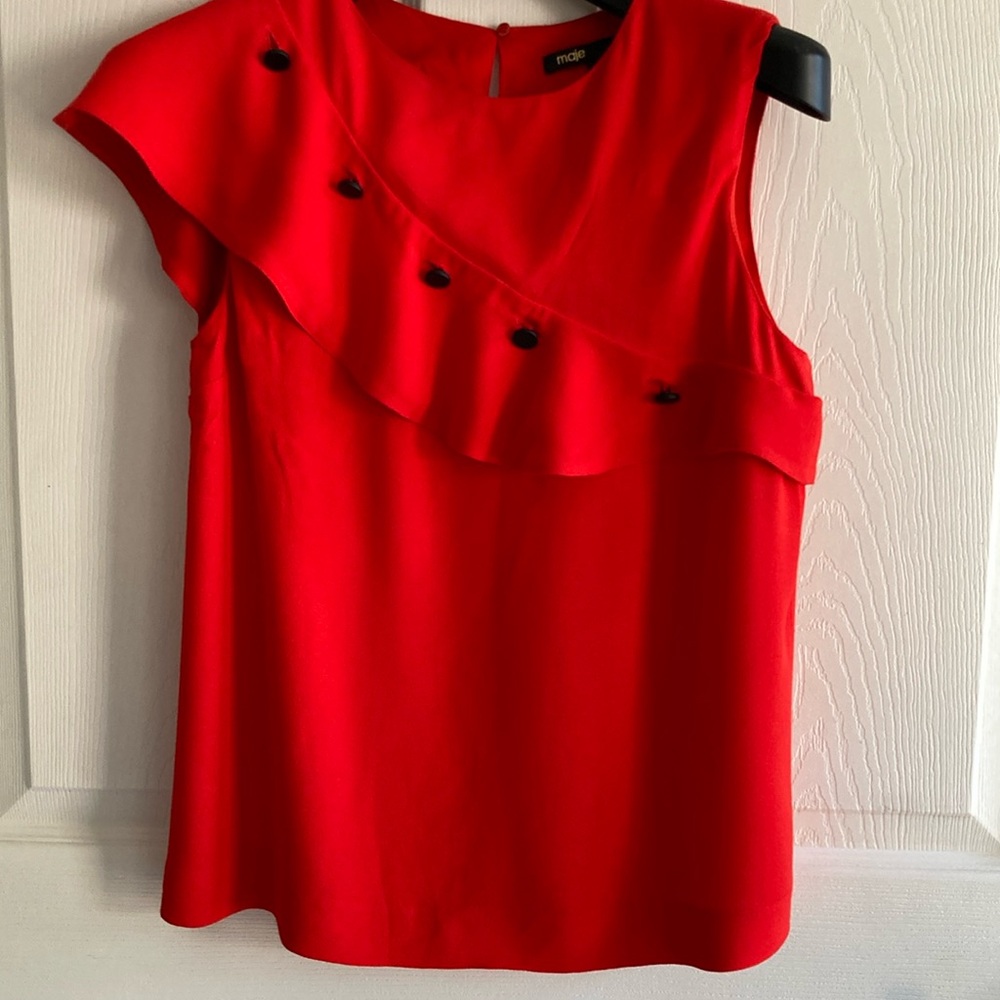 Maje asymmetrical red top with ruffles and button decorations. Size 4.